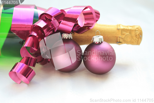 Image of Champagne and purple decorations