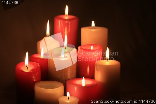 Image of group of burning candles