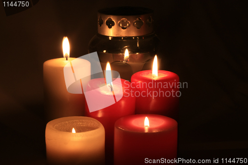 Image of group of burning candles