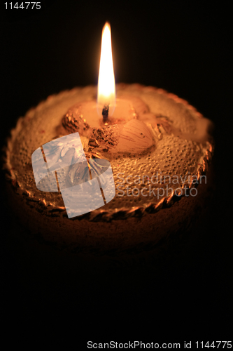 Image of detail of decorated christmas candle