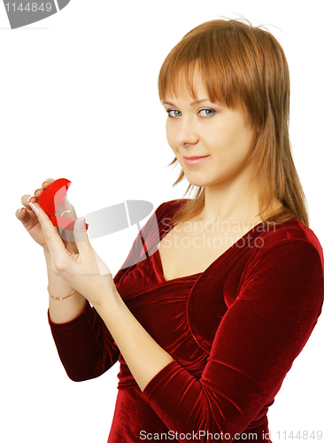 Image of young girl with a box for rings