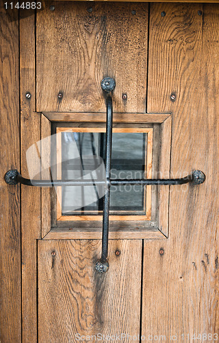 Image of Old door with a window