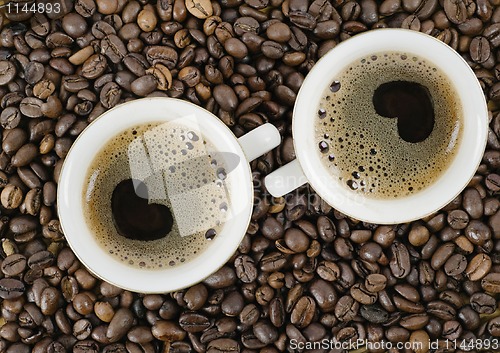 Image of grains and a cup from coffee, the top vie