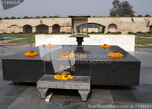 Image of Altar like platform with eternal flame on the spot where Gandhi was cremated.