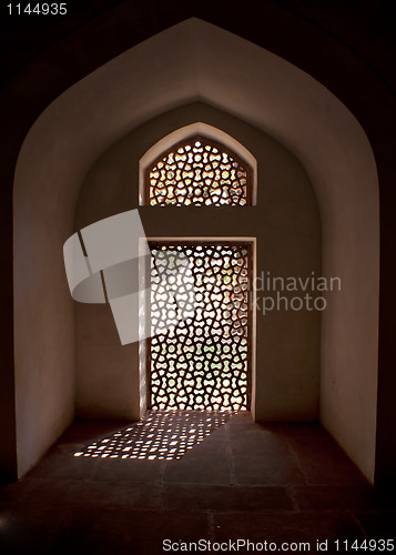 Image of Alcove with stone screen in window at the Humayun tomb in New Delhi.