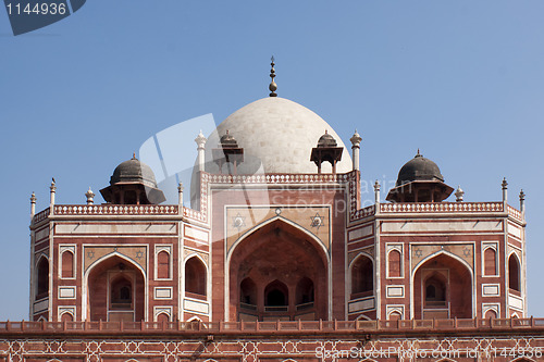 Image of Upper structure of the Humayun tomb peeping over the edge of the platform.