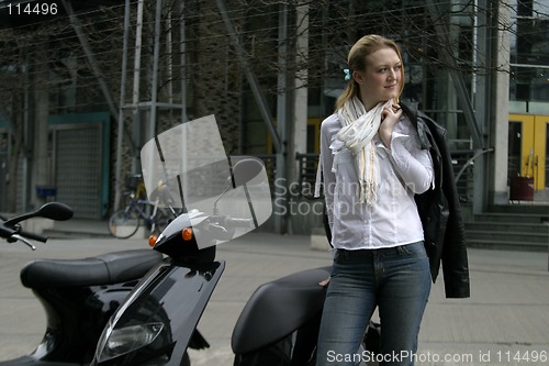 Image of Woman with Moped