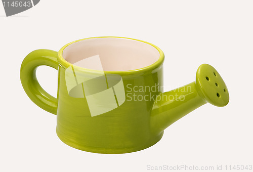 Image of green ceramic watering can