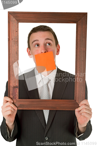 Image of Businessman with wooden frame