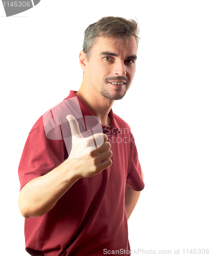 Image of young man thumb up and smiling isolated on white