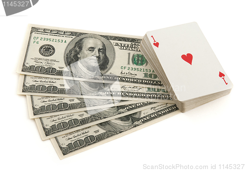 Image of Deck of cards and money on white background