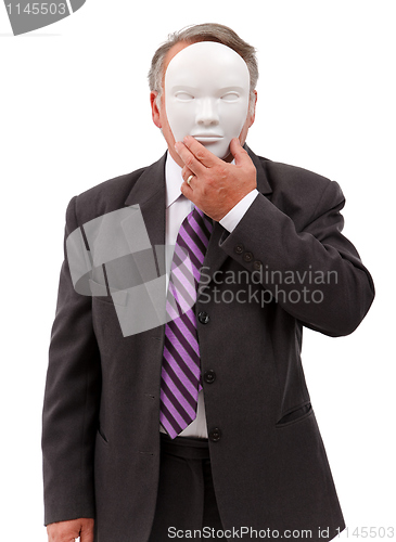 Image of Man covering his face with mask