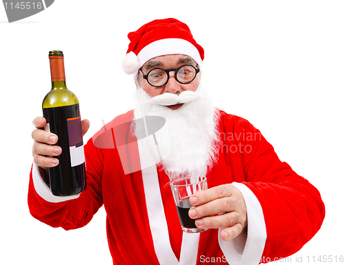 Image of Drunken Santa Claus with wine bottle
