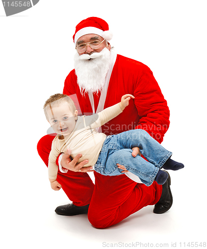 Image of Santa Claus with little boy