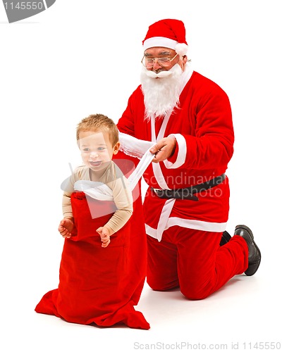 Image of Boy in Santa Claus's bag