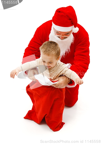 Image of Boy in Santa Claus's bag