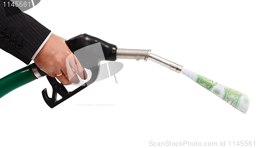 Image of Money pouring from gas nozzle
