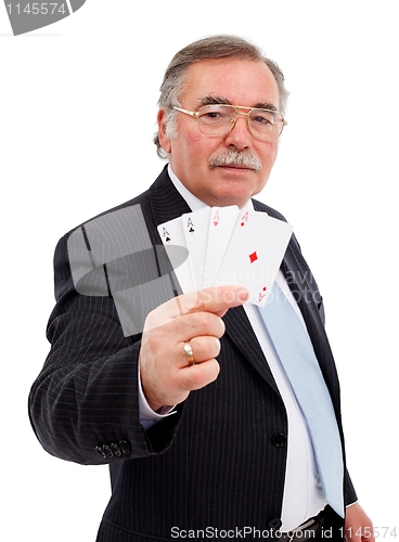 Image of Senior man showing the four aces