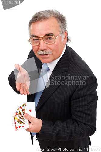 Image of Senior man showing royal flush