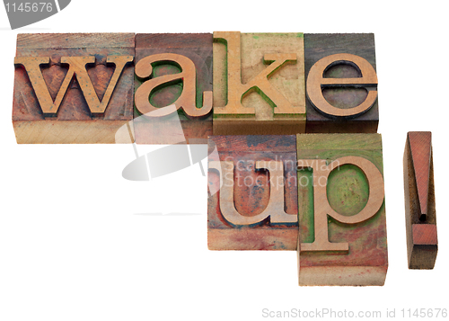 Image of wake up - phrase in vintage letterpress type