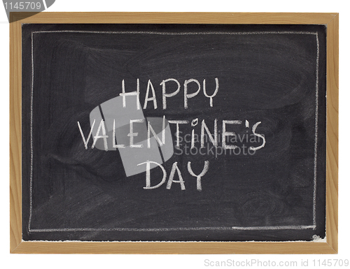Image of happy valentine day on blackboard
