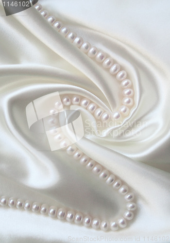 Image of Smooth elegant white silk with pearls 