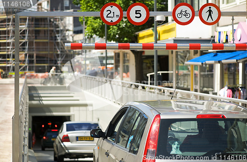 Image of cars driving into underground car park