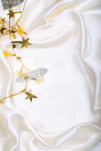 Image of Golden stars on white silk