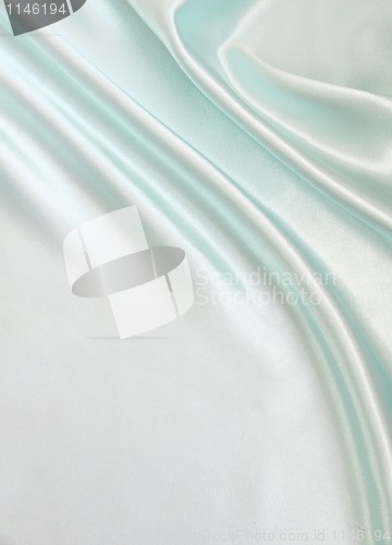 Image of Smooth elegant blue silk as background 