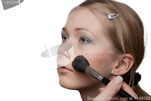 Image of Lovely blond at professional makeup studio