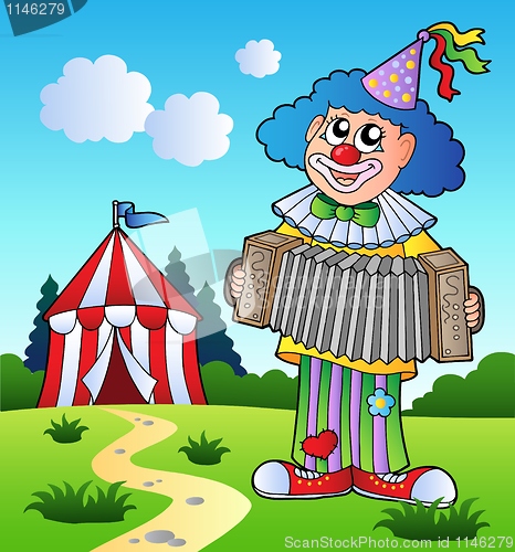 Image of Clown playing accordion near tent