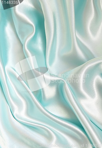 Image of Smooth elegant blue silk as background 