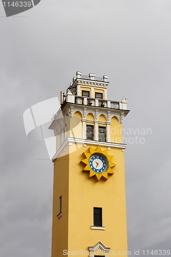 Image of City clock tower against cloudy sky