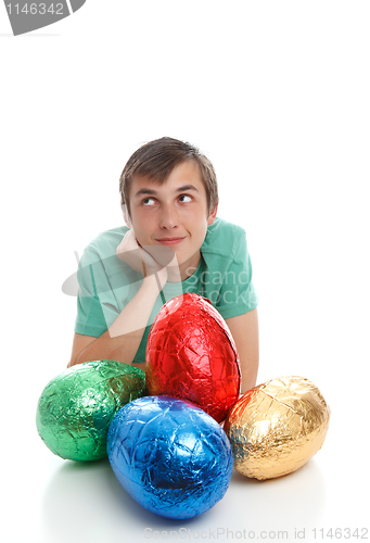 Image of Boy with large easter eggs