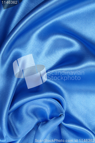 Image of Smooth elegant blue silk as background 