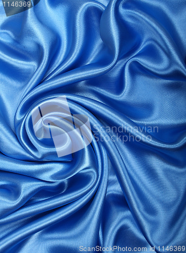 Image of Smooth elegant blue silk as background 