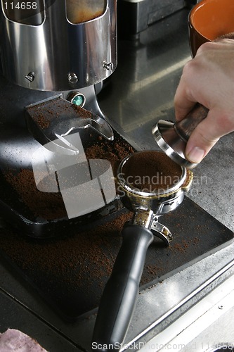 Image of Tamping Espresso Grounds
