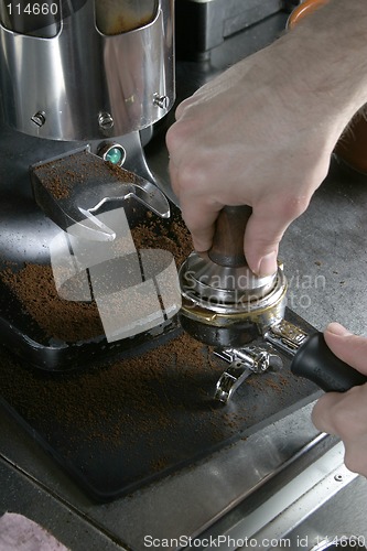 Image of Tamping Espresso Grounds