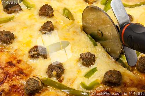 Image of Meatball pizza-closeup