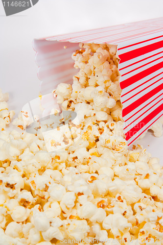 Image of Popcorn falling out of a holder