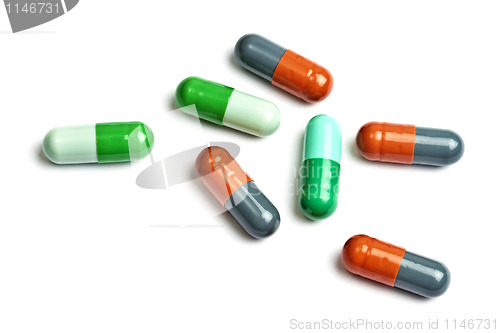 Image of A few colorful capsules isolated on white 