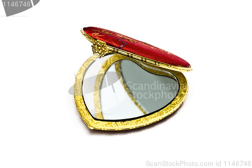 Image of Red cosmetic mirror isolated on white 