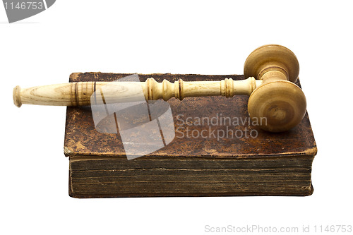 Image of Old book and gavel isolated on white background 