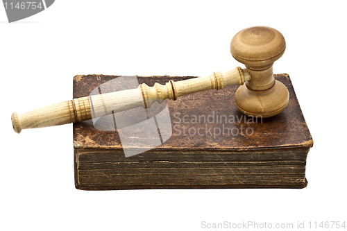 Image of Old book and gavel isolated on white background 