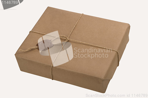 Image of parcel with a rope and wax