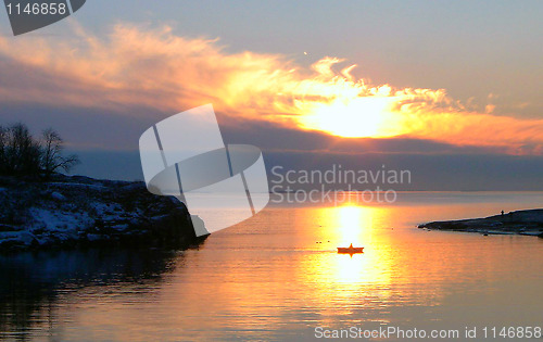 Image of Winter Sunset with Boat in Finland