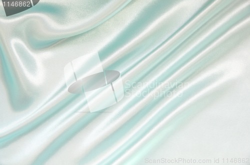 Image of Smooth elegant blue silk can use as background 