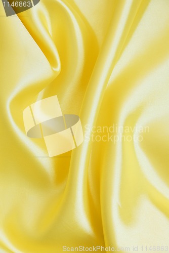 Image of Smooth elegant golden silk as background 