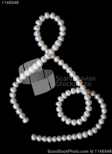 Image of White pearls on the black velvet 