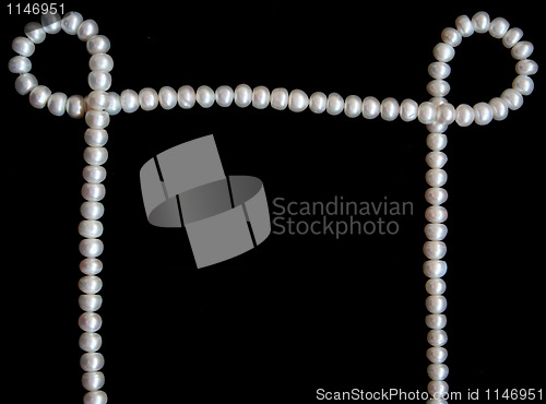 Image of White pearls on the black velvet 